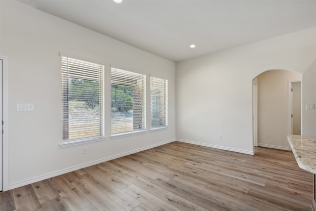 unfurnished room featuring light hardwood / wood-style flooring