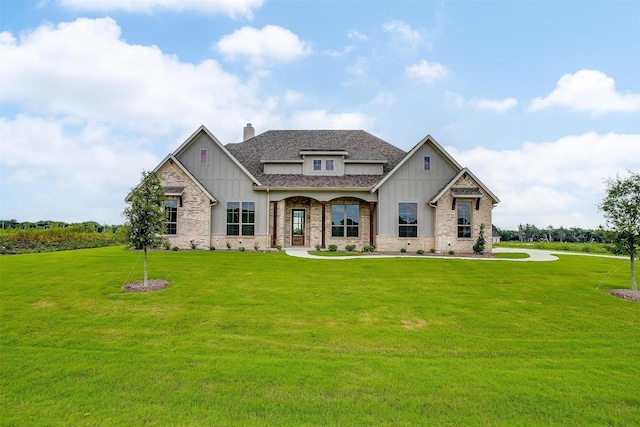 craftsman inspired home with a front yard