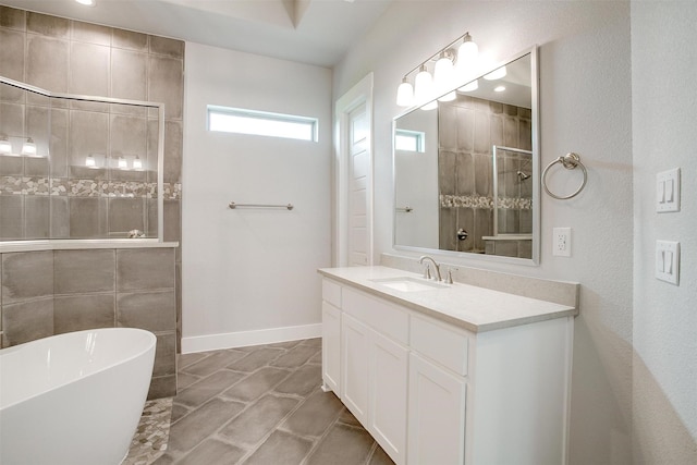 bathroom featuring tile patterned flooring, vanity, and separate shower and tub