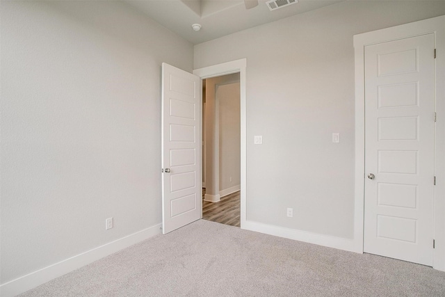 empty room featuring carpet floors