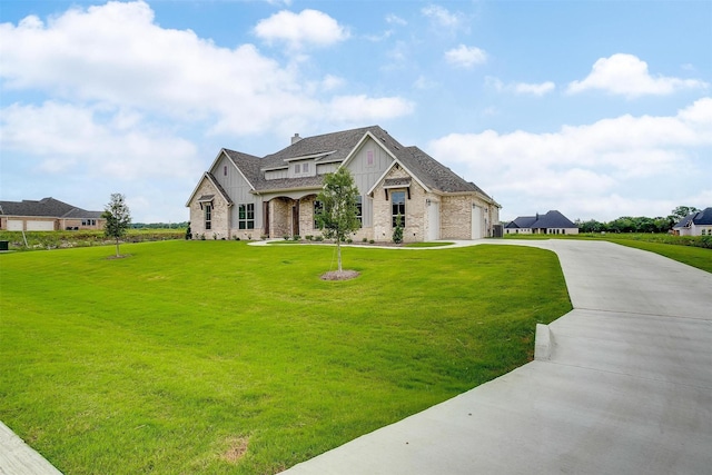 french provincial home with a front lawn