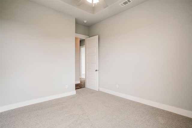 carpeted empty room with ceiling fan