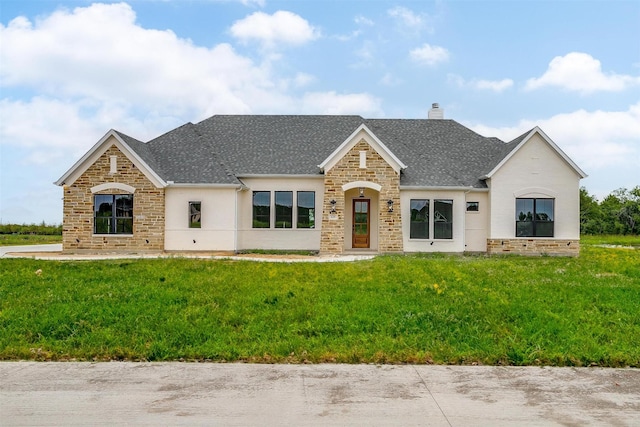 view of front of home with a front yard