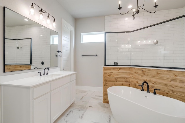 bathroom with vanity and a tub to relax in