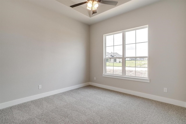 unfurnished room featuring carpet flooring and ceiling fan