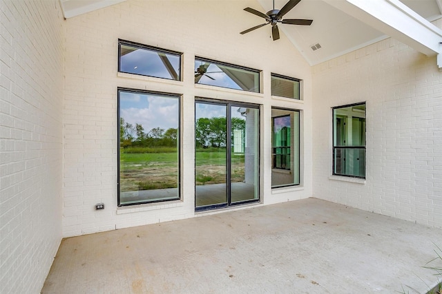 view of patio featuring ceiling fan