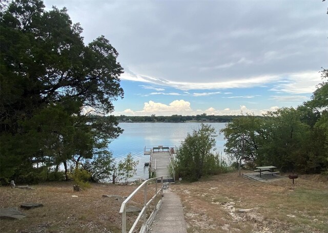 water view featuring a dock