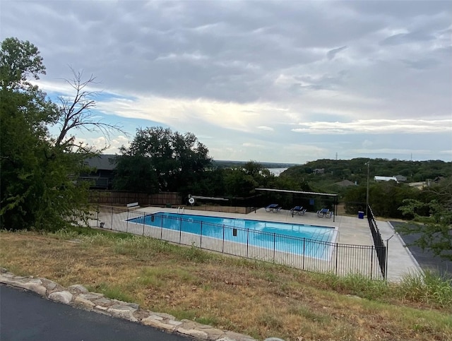 view of swimming pool with a patio