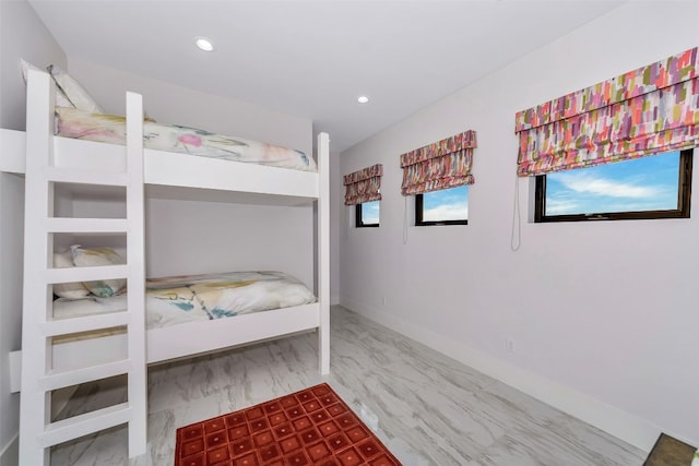 unfurnished bedroom with wood-type flooring