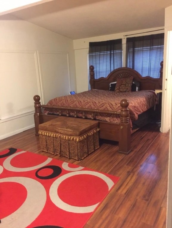 bedroom featuring dark hardwood / wood-style floors