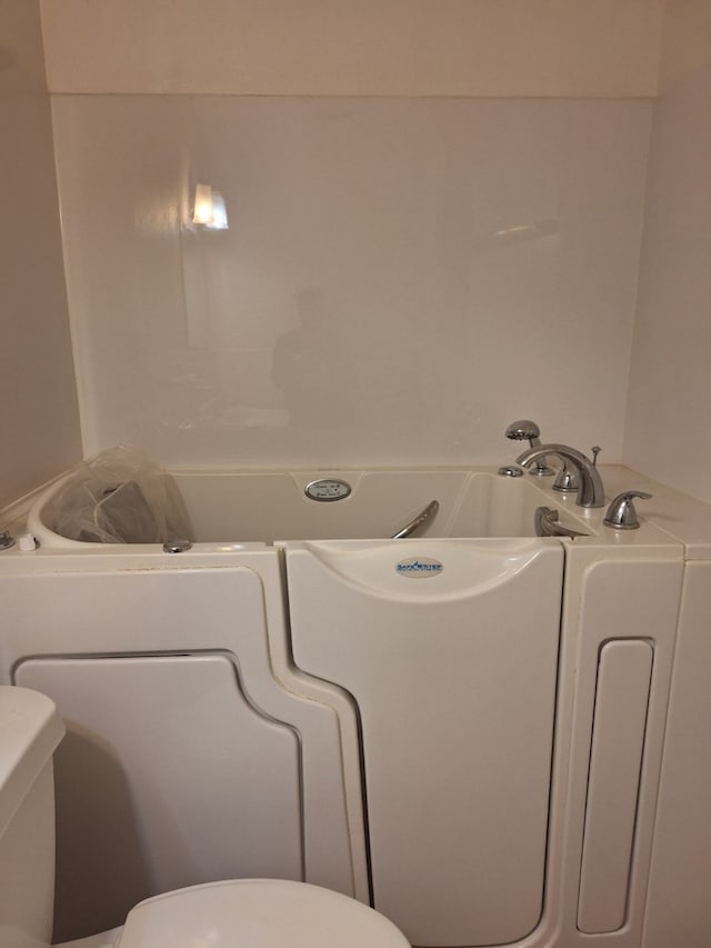 bathroom featuring toilet