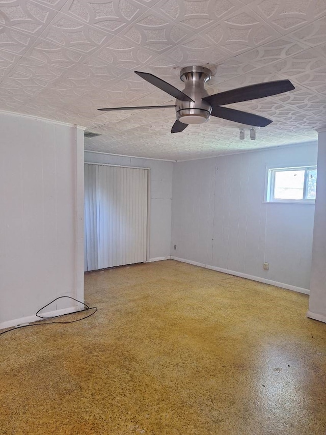 empty room featuring ceiling fan