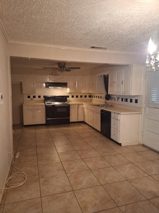 kitchen featuring black appliances, sink, decorative backsplash, a textured ceiling, and white cabinetry