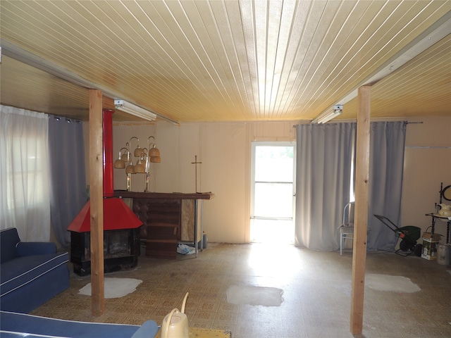 interior space featuring wooden ceiling