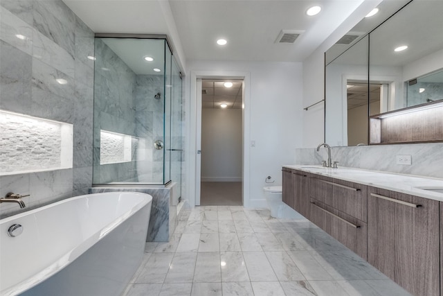 full bathroom with toilet, tile flooring, separate shower and tub, vanity, and tile walls