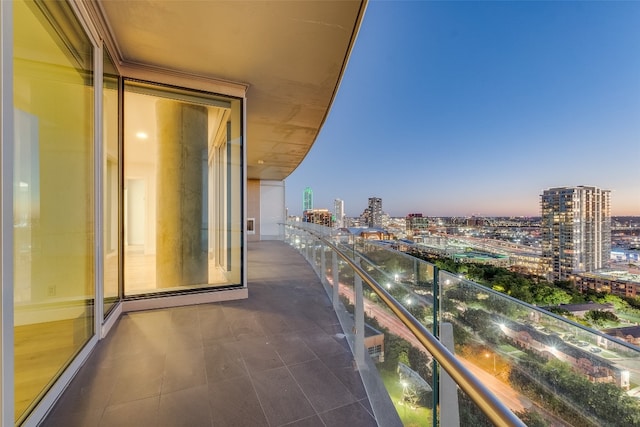 view of balcony at dusk