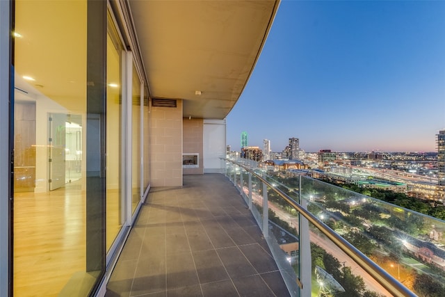 view of balcony at dusk