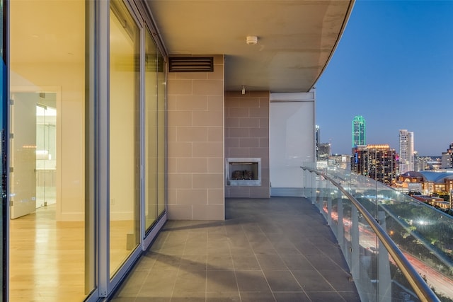 view of balcony at dusk