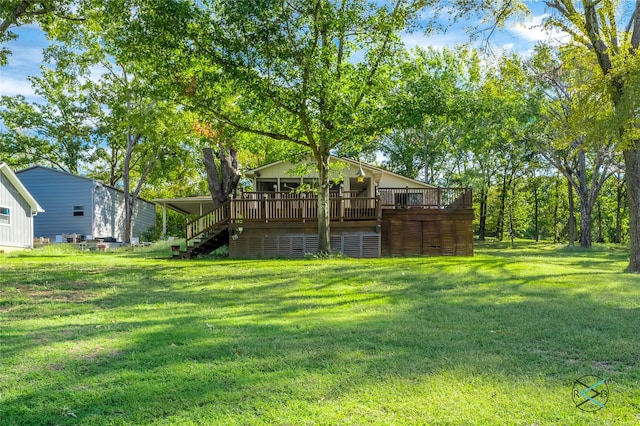 view of yard with a wooden deck