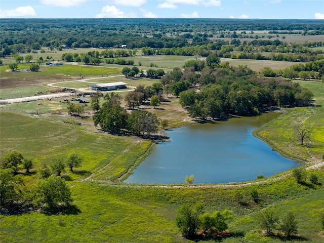 drone / aerial view featuring a rural view and a water view