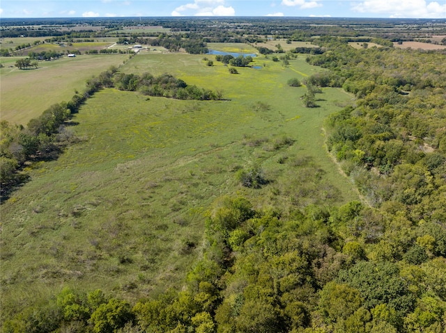 view of property's community featuring a lawn