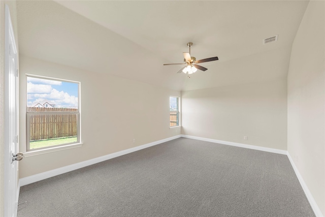 empty room featuring carpet and ceiling fan