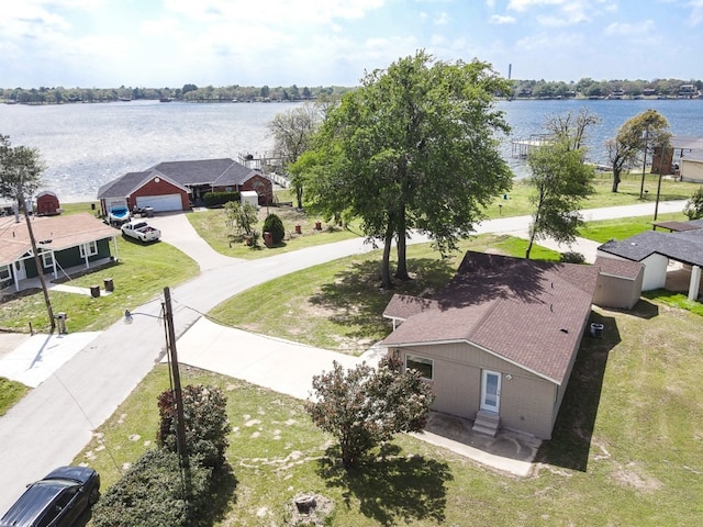 bird's eye view with a water view