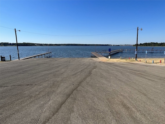 view of dock with a water view