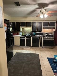 kitchen with ceiling fan, stainless steel gas range, light tile flooring, dishwasher, and exhaust hood