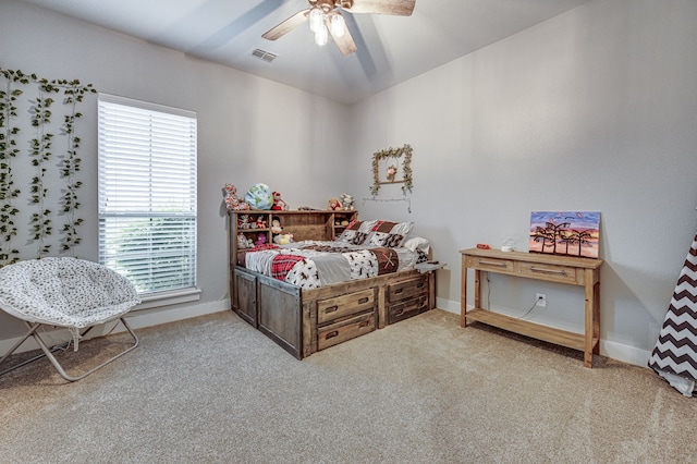 bedroom featuring ceiling fan and carpet flooring