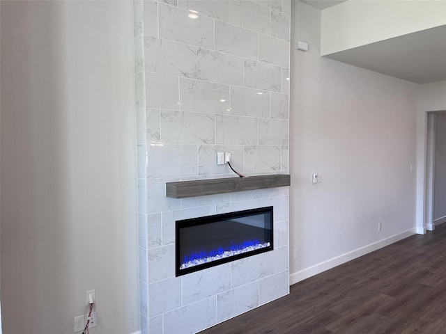 interior details with a fireplace and hardwood / wood-style floors