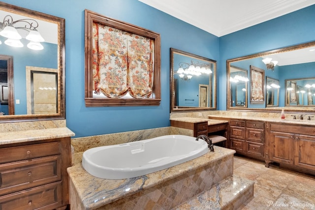 bathroom with ornamental molding, vanity, tile flooring, and tiled bath