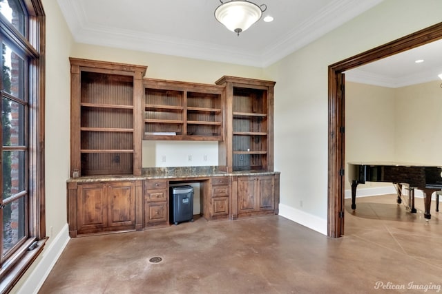 unfurnished office featuring ornamental molding