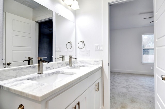 bathroom featuring dual bowl vanity