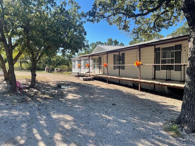 manufactured / mobile home with a wooden deck