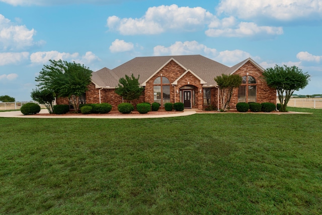 view of front of home with a front lawn