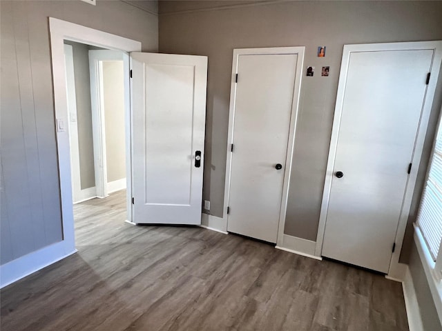 unfurnished bedroom featuring wood-type flooring