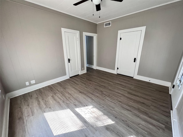 unfurnished bedroom featuring crown molding, ceiling fan, and hardwood / wood-style floors