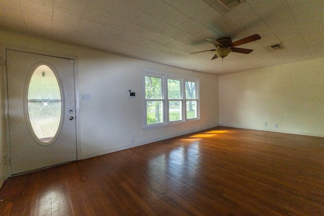 foyer with ceiling fan and dark hardwood / wood-style flooring