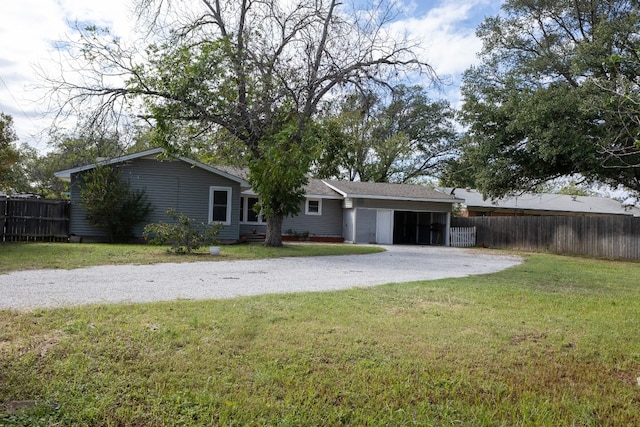 back of property featuring a yard