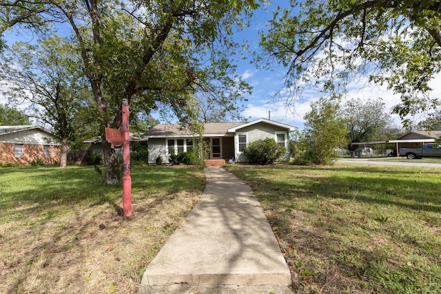 ranch-style house with a front yard