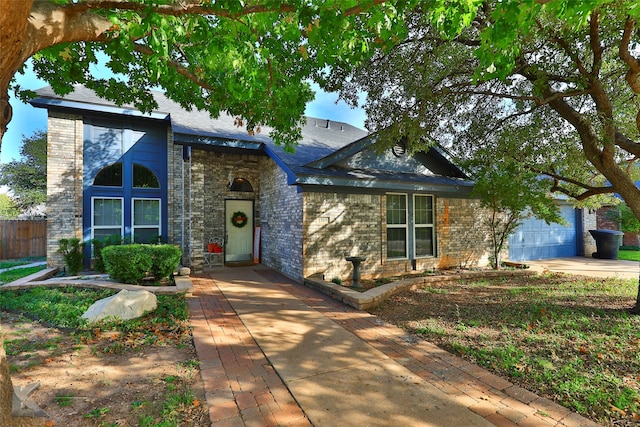 view of front of property with a garage