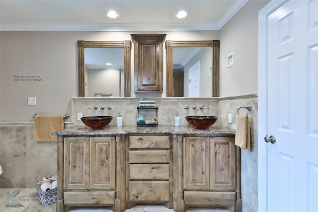 bathroom with vanity and ornamental molding