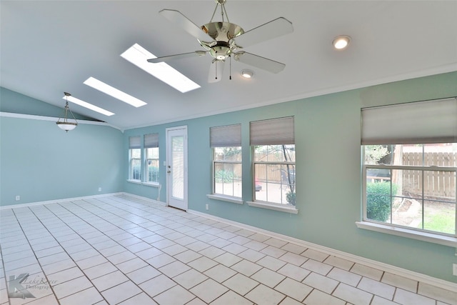 tiled spare room with lofted ceiling with skylight, ceiling fan, and crown molding