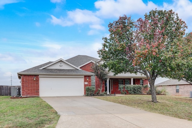 single story home featuring a front lawn and a garage