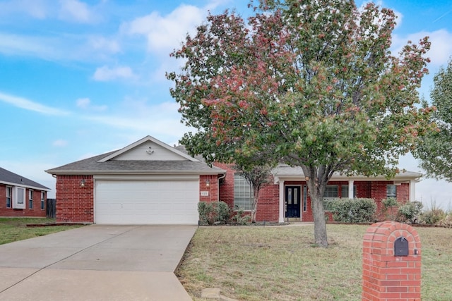 single story home featuring a front yard and a garage