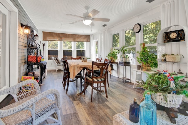 sunroom featuring plenty of natural light and ceiling fan