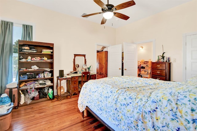 bedroom featuring wood-type flooring and ceiling fan