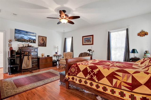 bedroom featuring ceiling fan and light wood-type flooring