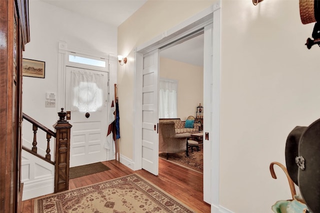 foyer with dark wood-type flooring